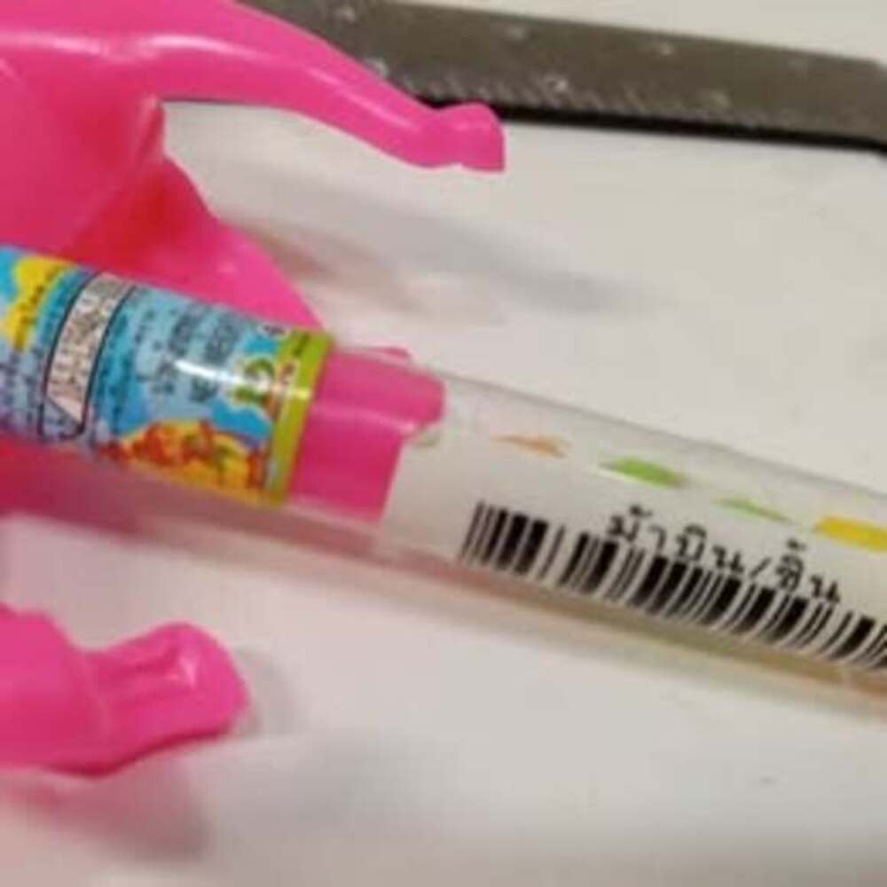 Pink Dinosaur Candy Dispenser with Candies